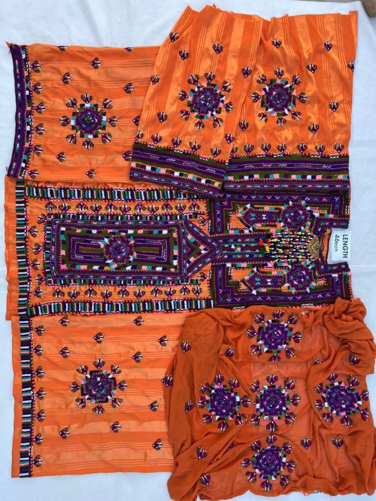 Traditional Balochi outfit with intricate handmade embroidery and vibrant cultural patterns.